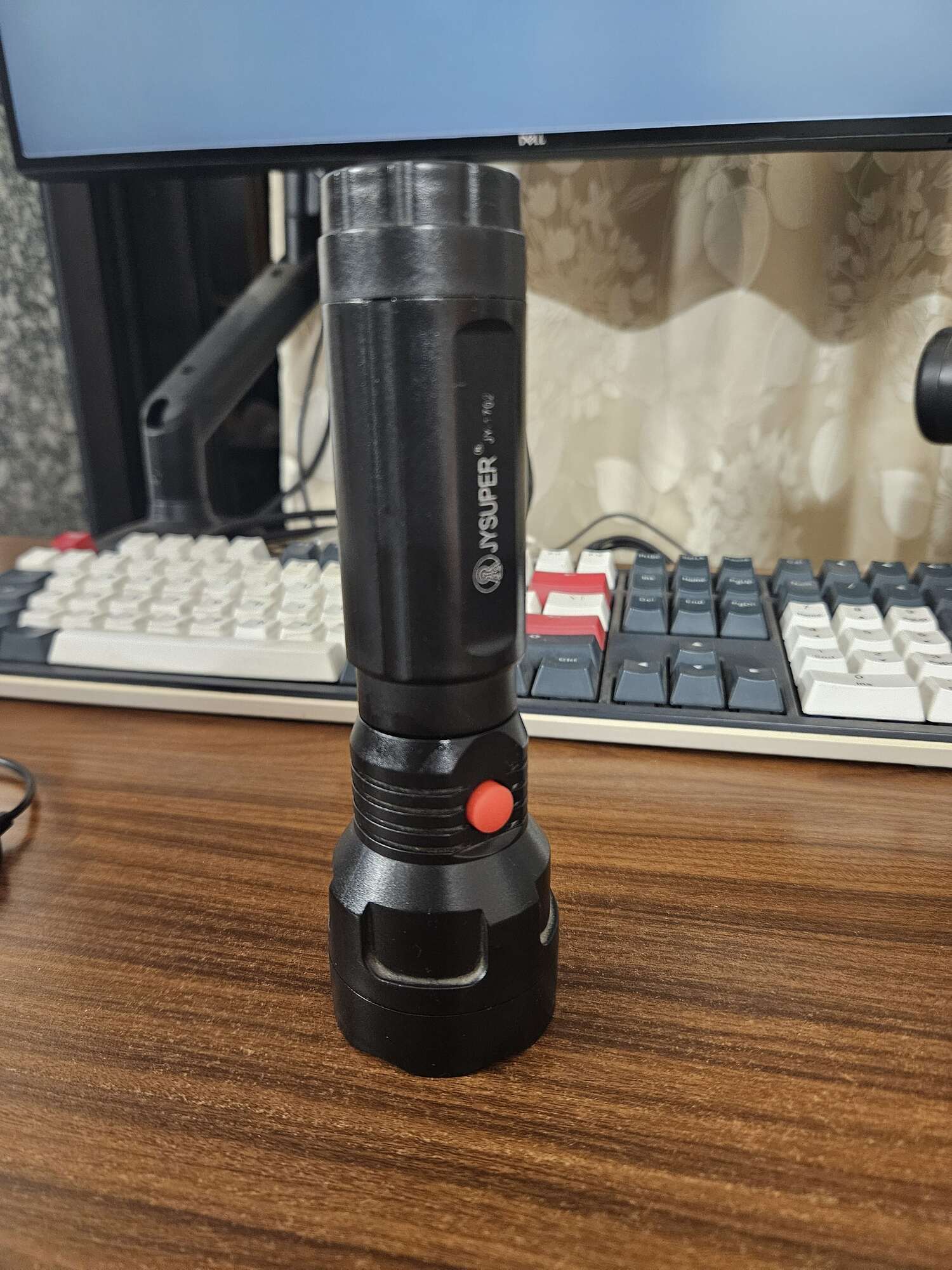 The fixed torch standing on a desk